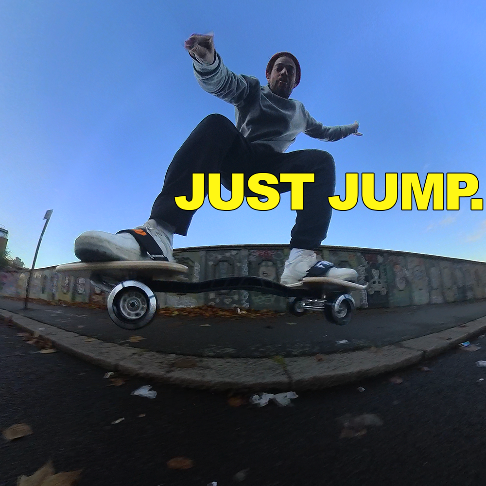 Surfskater Jumping off a Curb