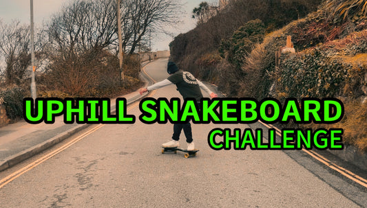 Uphill Snakeboard Challenge text with a snakeboarder 